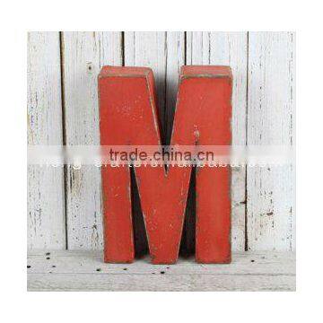 Wall mounted letter with distressed tin finish