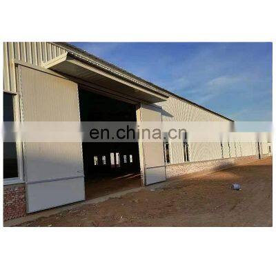 Qingdao light metal building construction gable frame prefabricated industrial steel structure warehouse