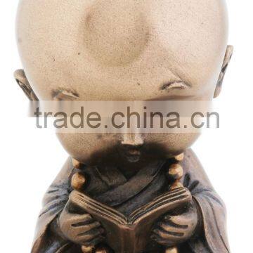 Joyful Monk Reading Baby Buddha Figurine