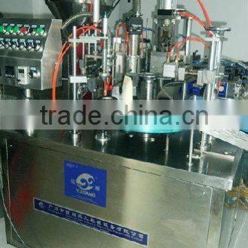 Aluminum tube filling and sealing machine