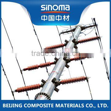 Electrical power transmission pole with fiberglass composite