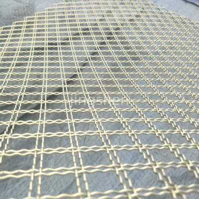 Decorative Woven Brass and Stainless Steel Crimped Wire Mesh, Offering Bending, Cutting, and Welding Services.