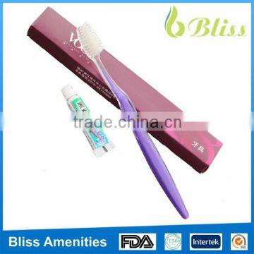 N127 Good quality hotel disposable two color toothbrush with leaf shape