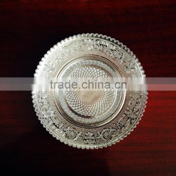 round glass plate with engraved pattern