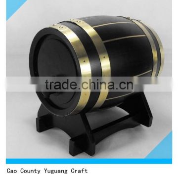 black wooden wine bucket with tap and wooden base