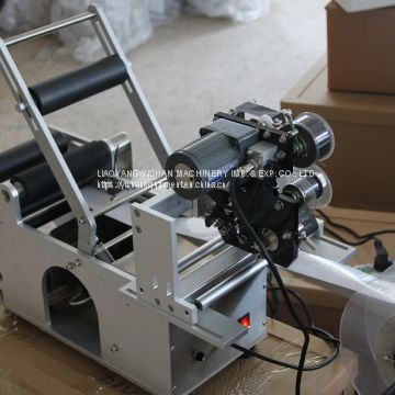 Semi automatic round bottle labeling machine