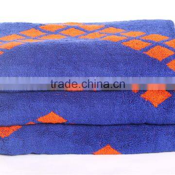 China Guangdong towel factory pure cotton yarn-dyed jacquard blue/orange beach towel