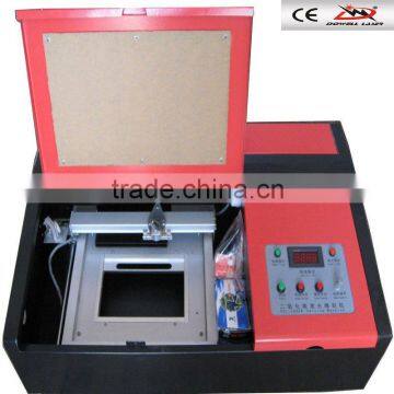 HIgh performance DW-3020 stamp laser engraving machine/Cheap small size rubber stamp laser engraver