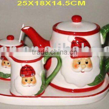 ceramic teapot, sugar pot and milk pot with santa design