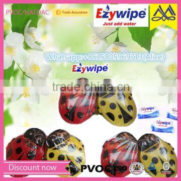 outside portable coin tissues, round candy wrapped towels, face/hand compressed towel