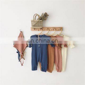 Infant spring solid color pit strip long-sleeved one-piece suit for men and women treasure bag fart romper romper send hat