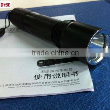 Adjustable beam anti riot flashlight