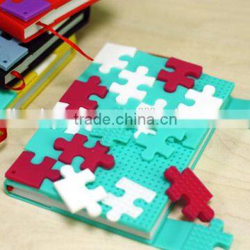 Lovely and colorful silicone notebook, puzzle surface notebook