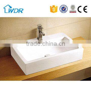 Above counter mounting ceramic long rect wash basin with one hole