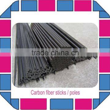 Unidirectional carbon fiber poles