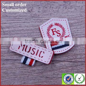 Embossed print logo jeans leather patch labels