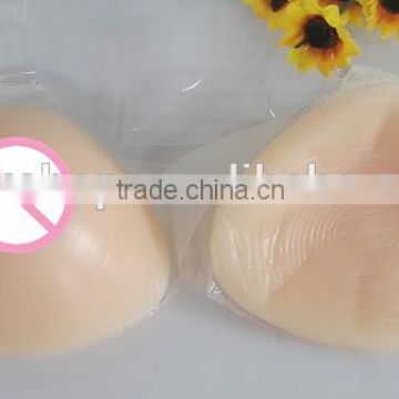 backside adhesive avaliable triangle shape cheap price hot sales new cross dresser silicone breasts with straps transparent