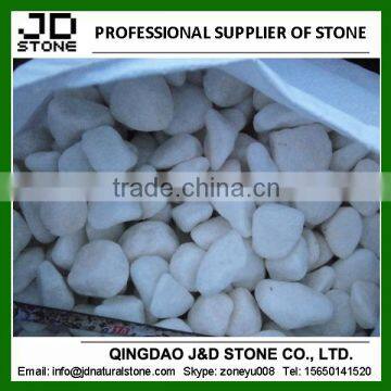 white pebbles paving stone