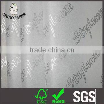 White paper with silver logo print tissue paper wrapping