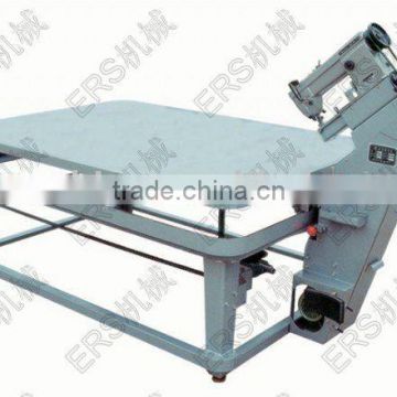 Mattress tape edge sewing machine