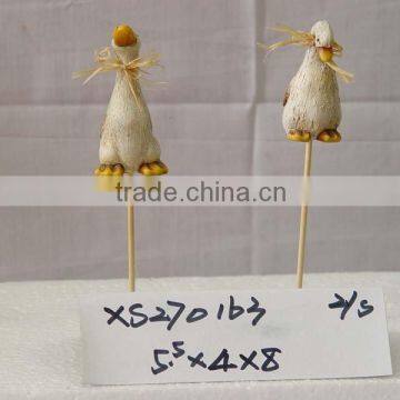 Terracotta duck on stick,2asst.