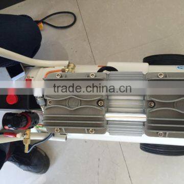 0.28m3 Oil-free Mute-type Piston Air Compressor With Wheels photo-3