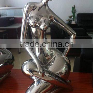 Stainless steel sculpture naked women sitting on table Hebei manufacturer