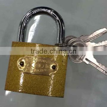 iron brass padlock in yellow or gray color with master key