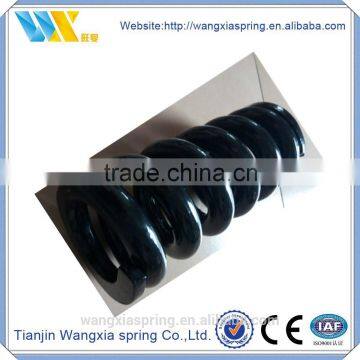 Compressed coil spring