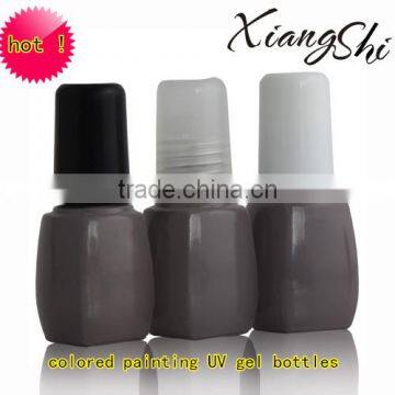 gray painting uv gel nail polish bottles with soft brush