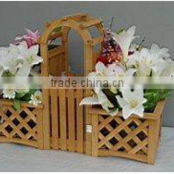 Wooden garden planter with trellis