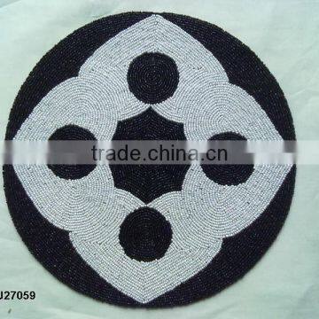Round White on Black Glass bead place mats with patterns available in more colours and patterns