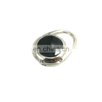 Custom black crystal round metal bag hanger