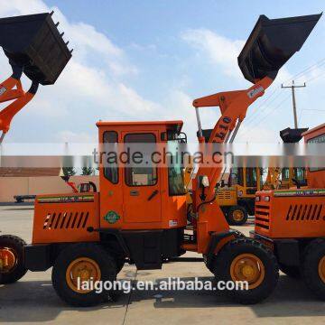 Wheel loader with side dump bucket; small garden tractor loader