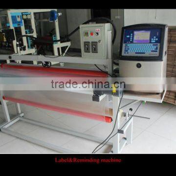 label sticking film packing machine