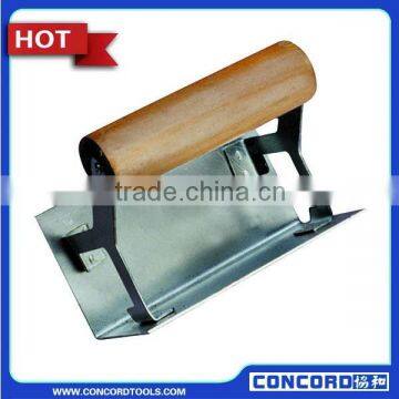 Internal corner brick trowel with wooden handle