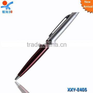 silver red metal ballpoint pen