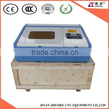 Mini CO2 Photo Laser Engraving Machine 40W 300*300mm 40W With Honey Comb Table Infrared Positioning System ZK-3030