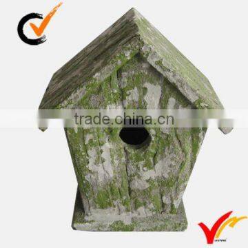 shabby chic colored wooden birdhouse