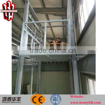 hydraulic vertical lead rail cargo platform lift guild rail lift for goods from China factory