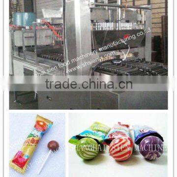 Automatic lollipop machine-inserting stick system