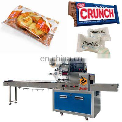 Auto food flow packaging machine bread chocolate bar pillow packing machine spaghetti noodle candy horizontal packing machine