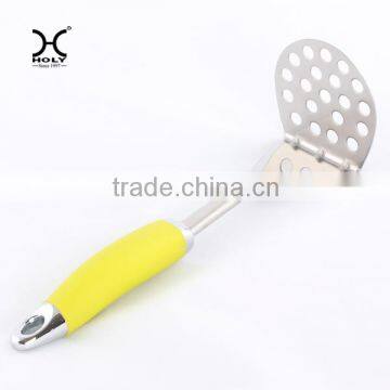 smooth potato masher with yellow handle