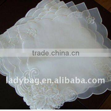 white embroidered table napkin